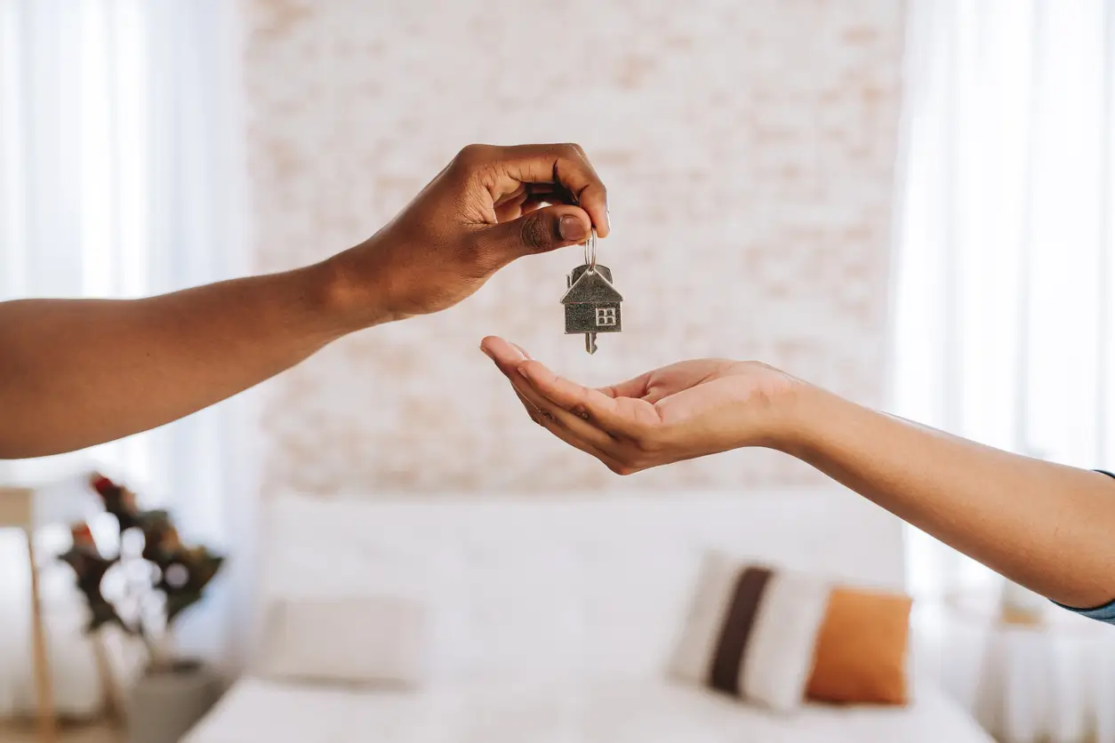 People exchanging keys