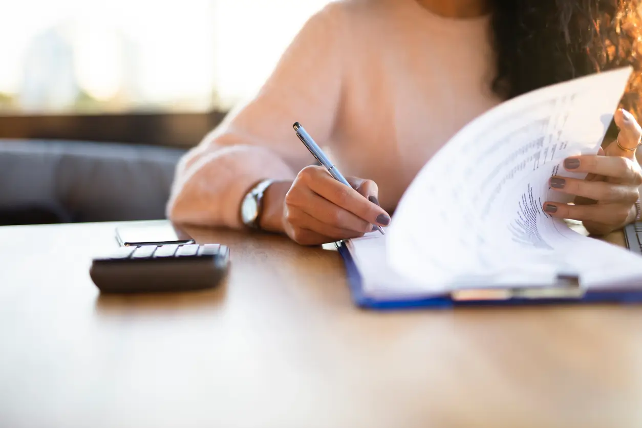 woman ticking a checklist