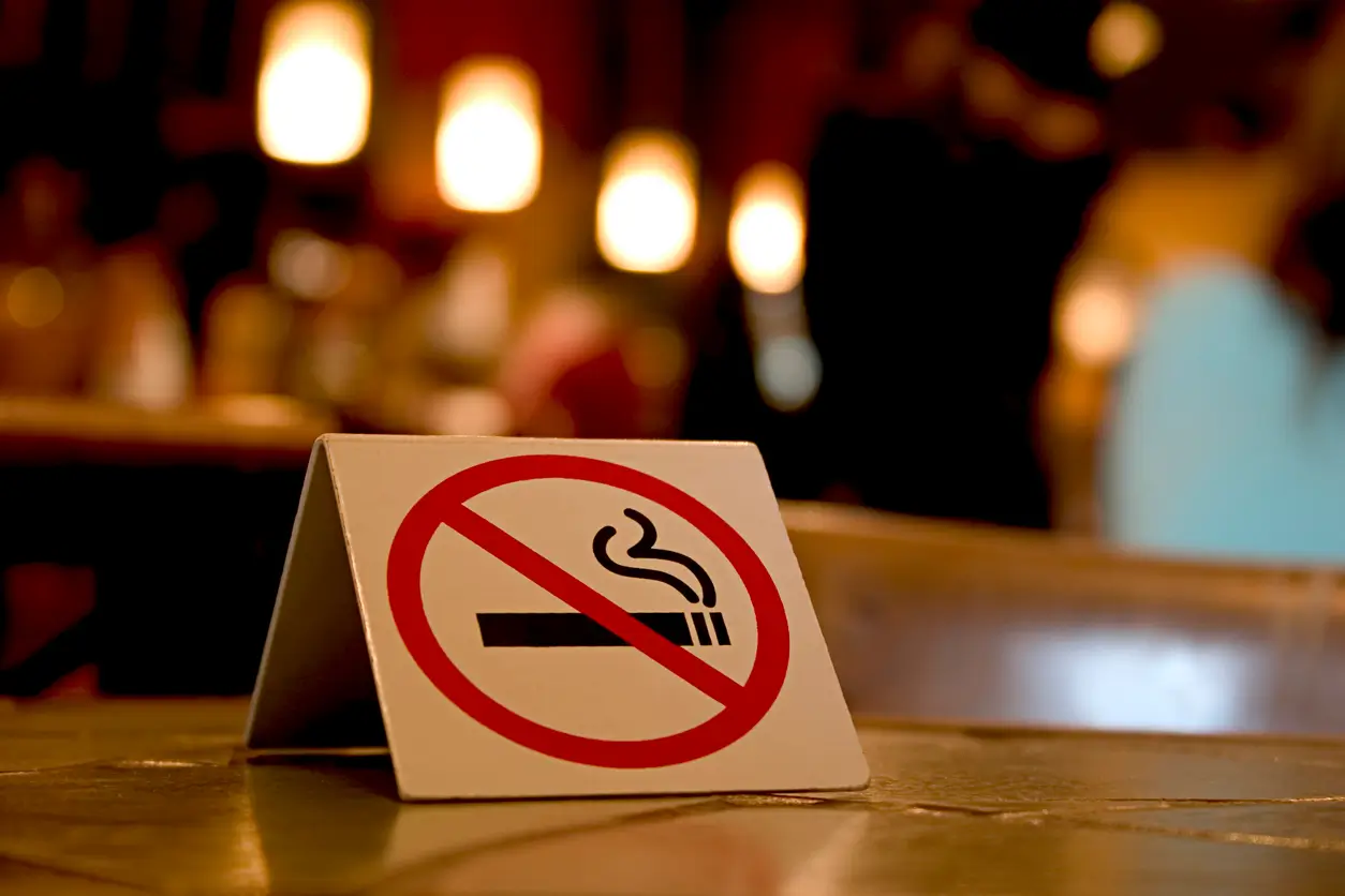 no smoking sign on a table