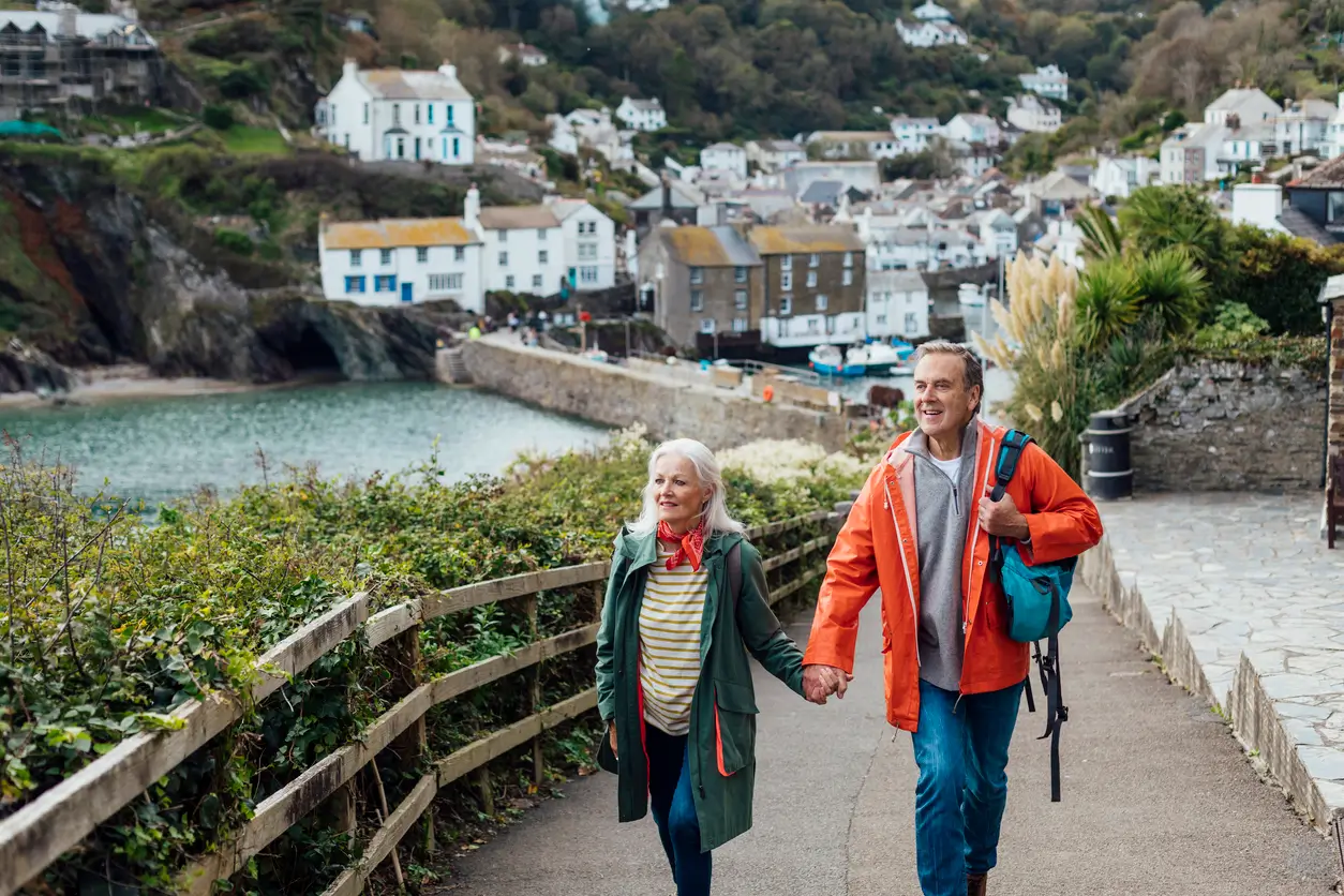 old couple enjoying a coastal walk