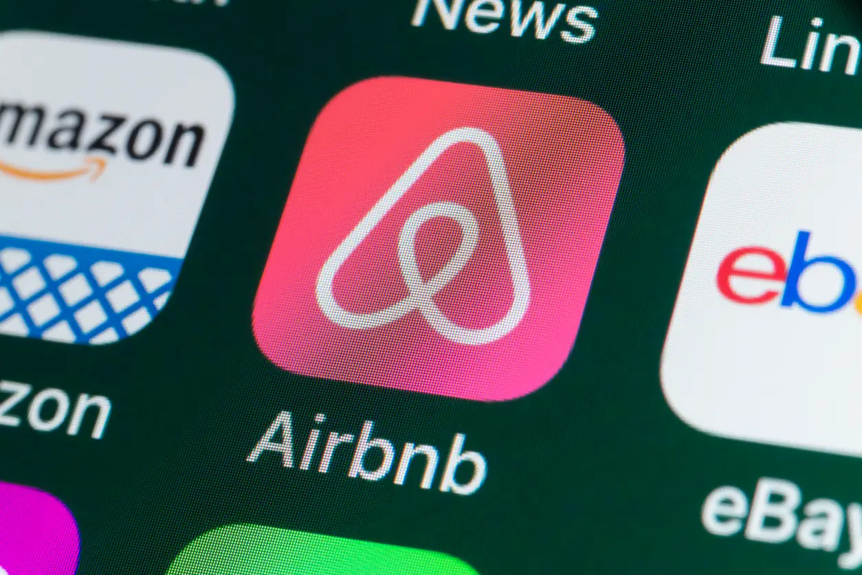 photo of airbnb app on a screen
